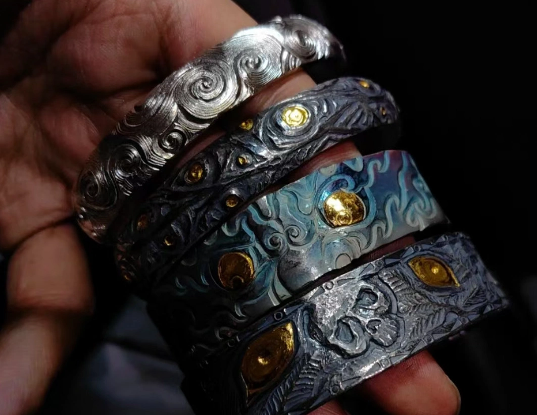 Engraved Silver Cuff In Hand
